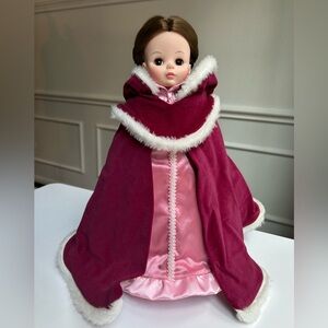 Madame Alexander Disney Winter Belle 14” Doll with Burgundy Cape and Stand.